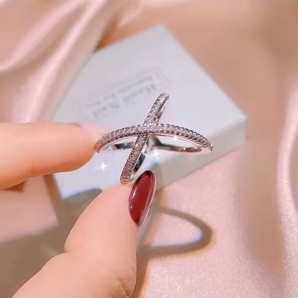 Anthropologie Jewelry - Anthropologie Silver Crystal X Crossover Ring